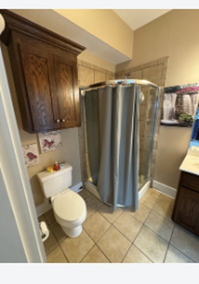 Bathroom before restoration following burst pipe water damage in a Charlotte NC home