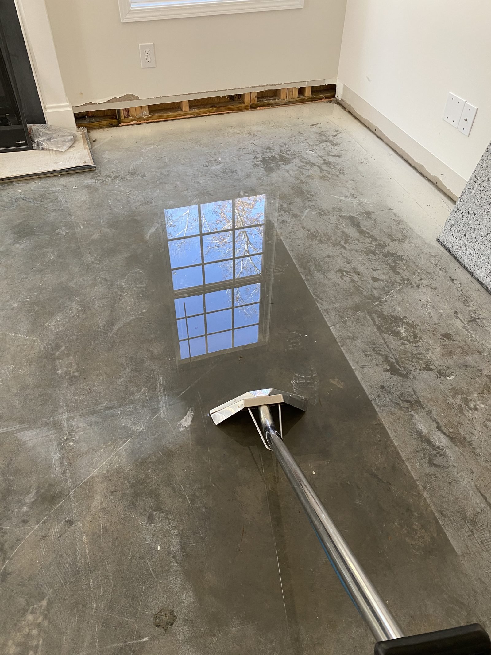 Water extraction from a Charlotte NC home's subfloor after a burst pipe